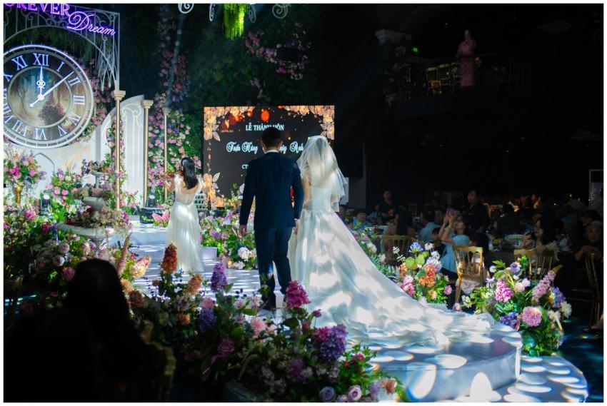 Beautiful wedding ceremony indoors with floral dec