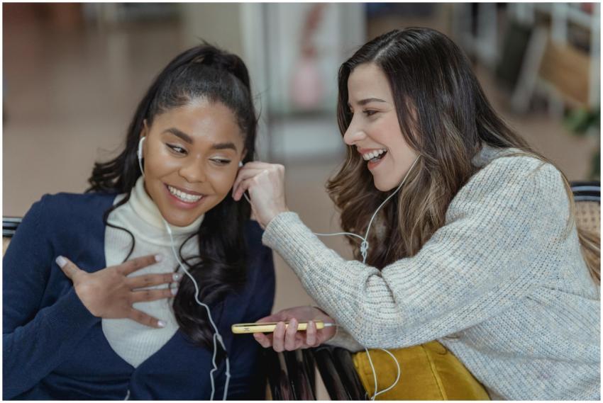 Multiracial cheerful women smiling and enjoying mu