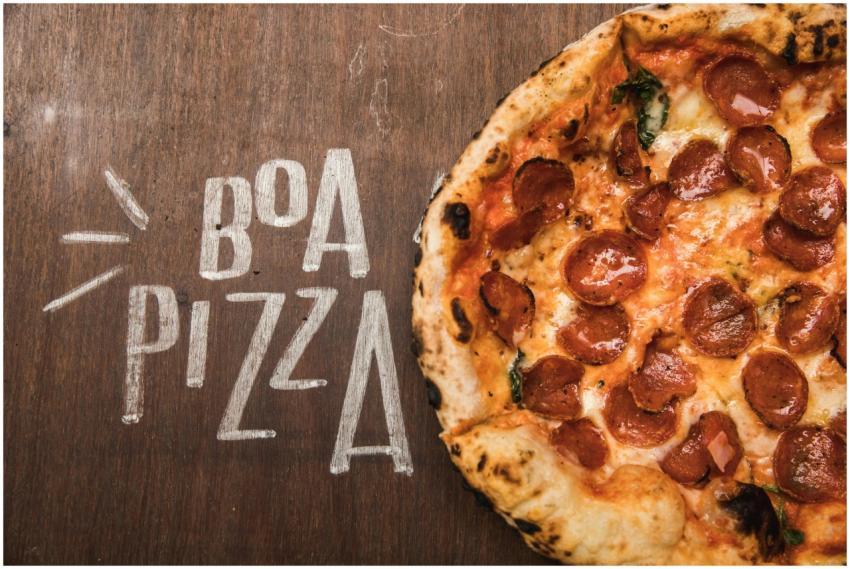 Mouth-watering pepperoni pizza on a rustic wooden