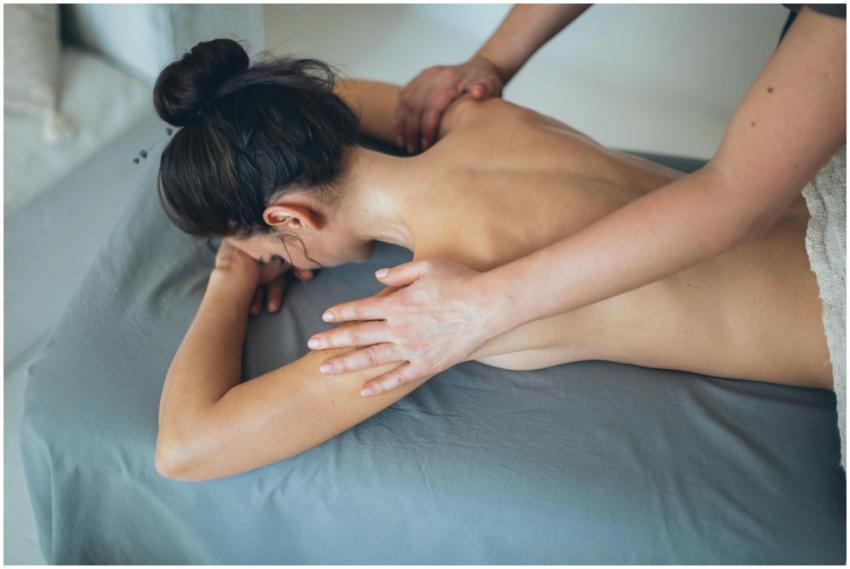 Woman receiving a relaxing massage in a spa, focus