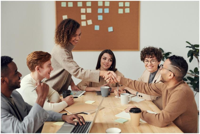 Diverse team collaborating in a meeting, showcasin