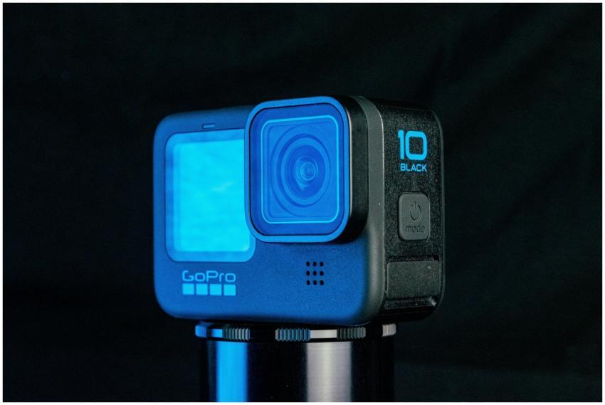 A modern GoPro camera with blue accents against a