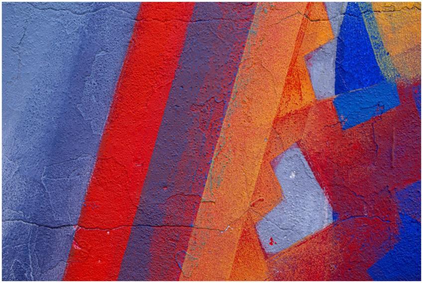 Close-up of a colorful abstract street art mural w