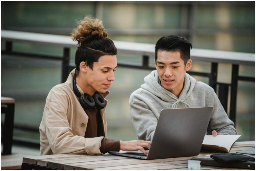 Concentrated multiracial young male students in ca