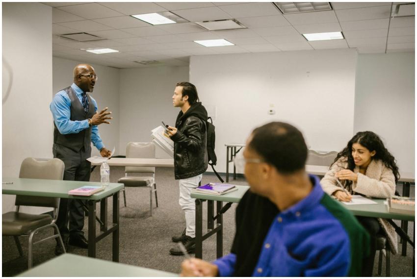 Teacher engaging with students in a diverse classr