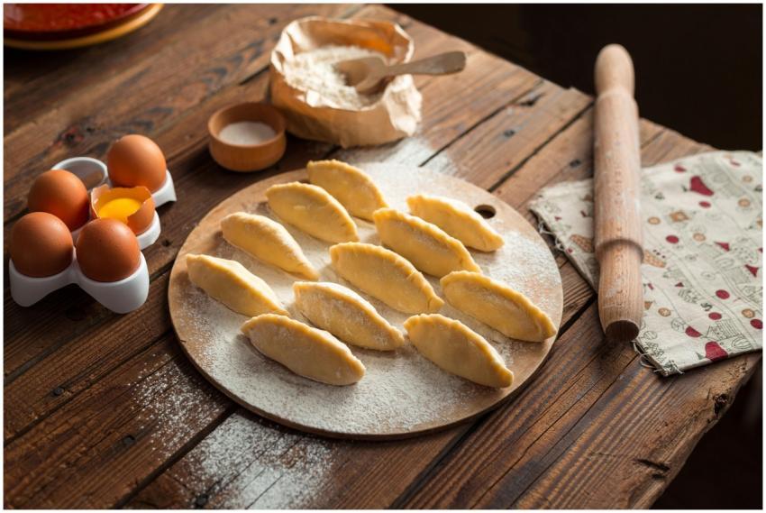 A cozy kitchen scene featuring homemade dumplings