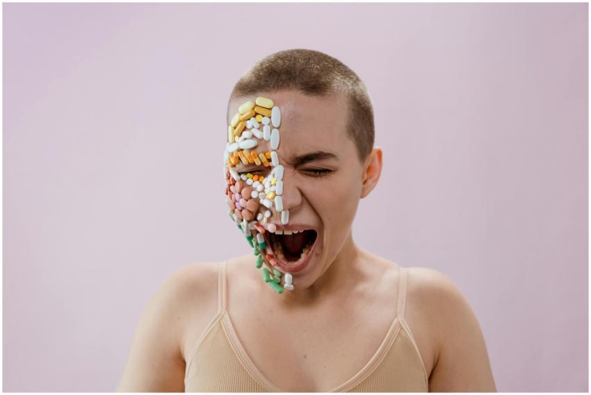 A striking portrait of a young woman with pills ar