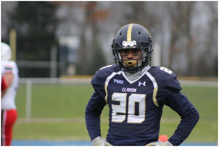 Focused American football player wearing a helmet