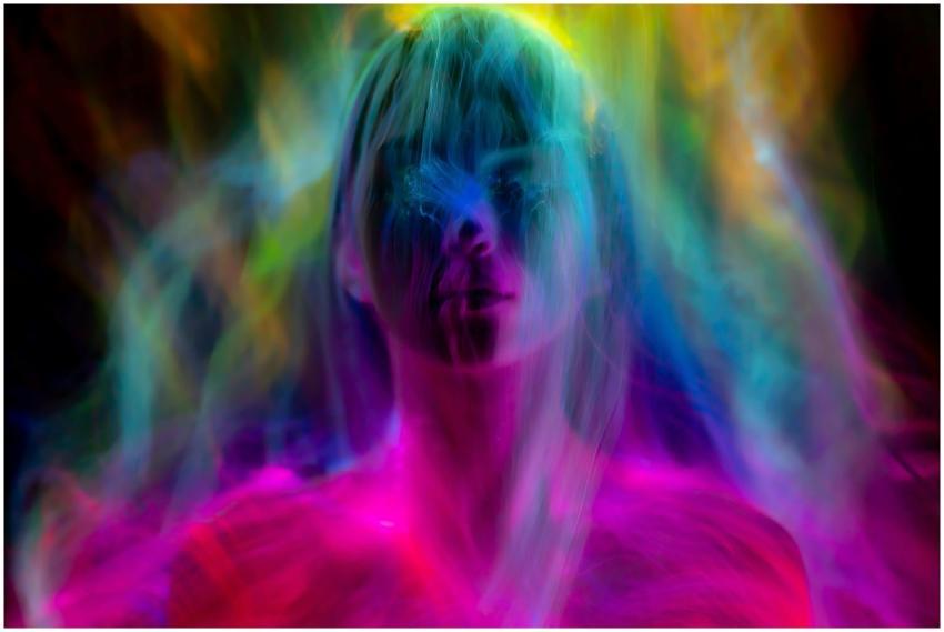 A vibrant abstract image of a woman's silhouette e