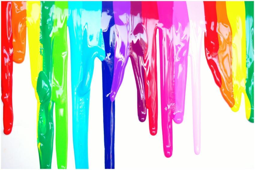 Bright, colorful paints dripping creating a rainbo