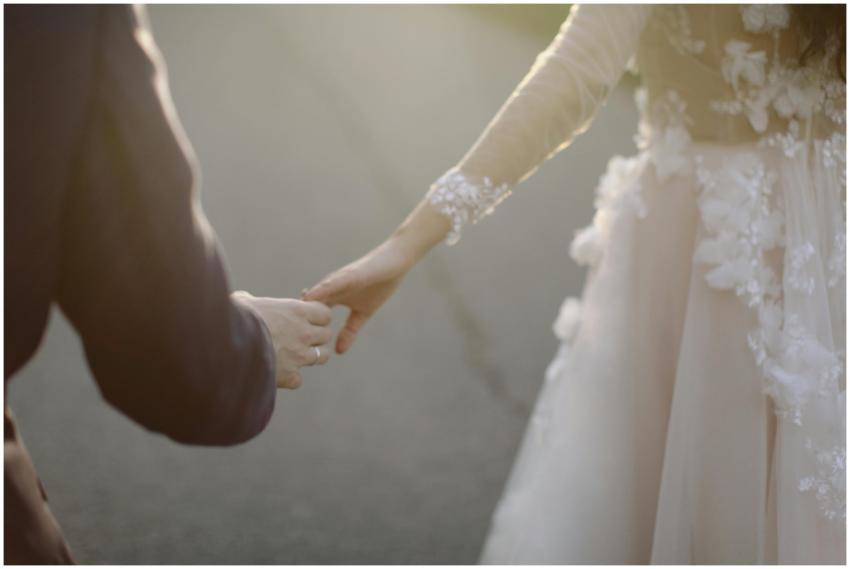 A tender moment captured of a bride and groom hold