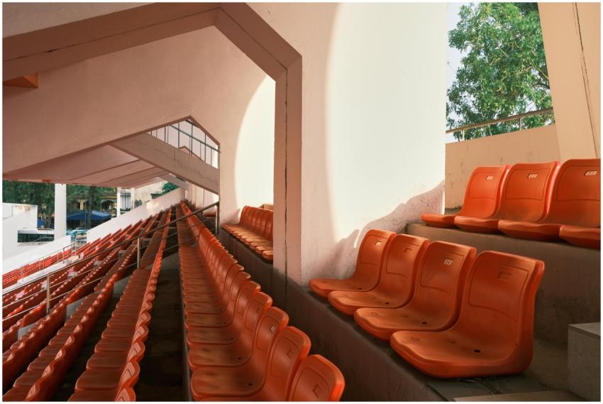 Empty orange stadium seats in Hải Phòng, Vietnam,