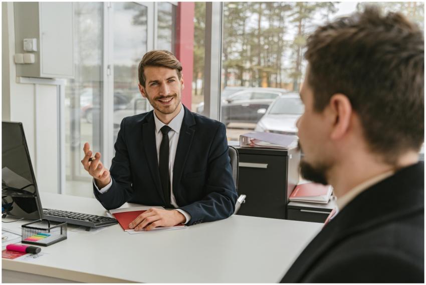 Two businessmen having a conversation in a modern