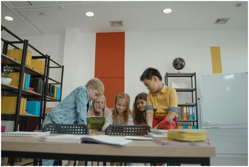 A group of diverse children reading together in a