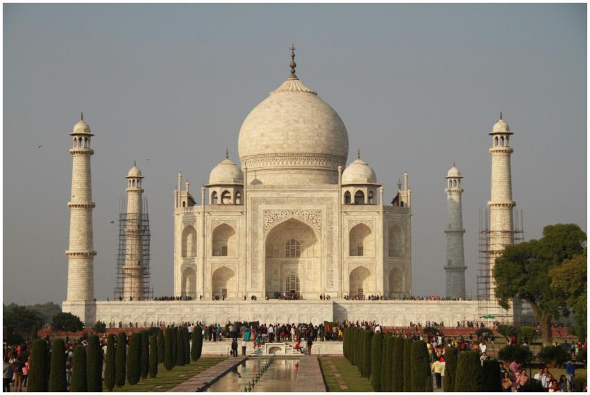 View of the iconic Taj Mahal with tourists, showca