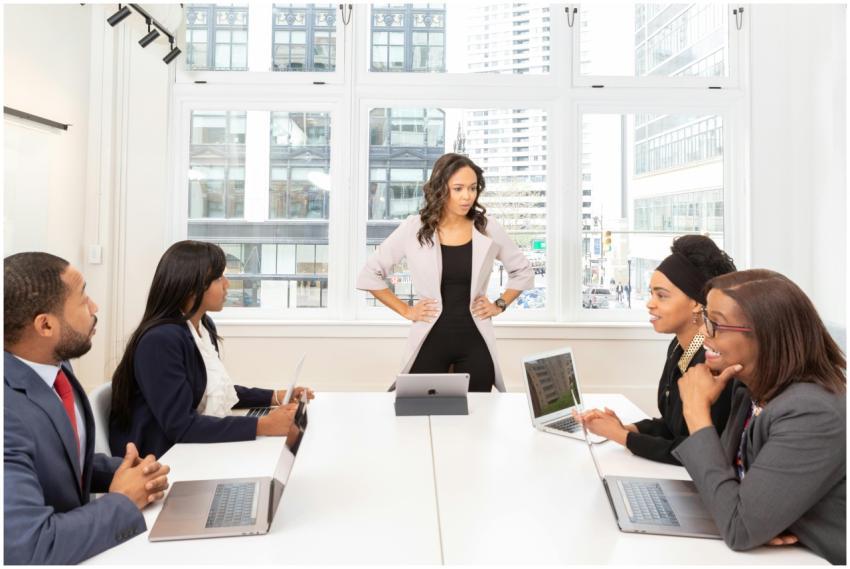 A diverse group of professionals engaged in a meet