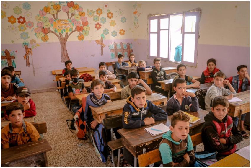 Boys attentively studying in an Idlib classroom, c