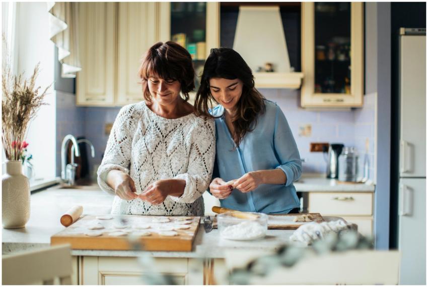 A mother and daughter enjoy preparing traditional