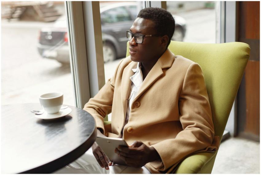 Serious African American male in trendy formal sui