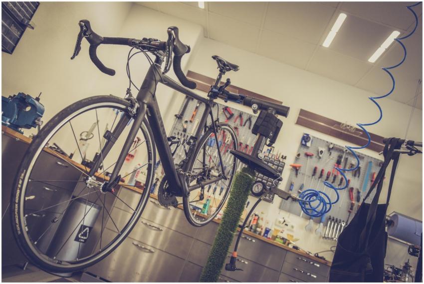 Detailed view of a bicycle being repaired in a mod
