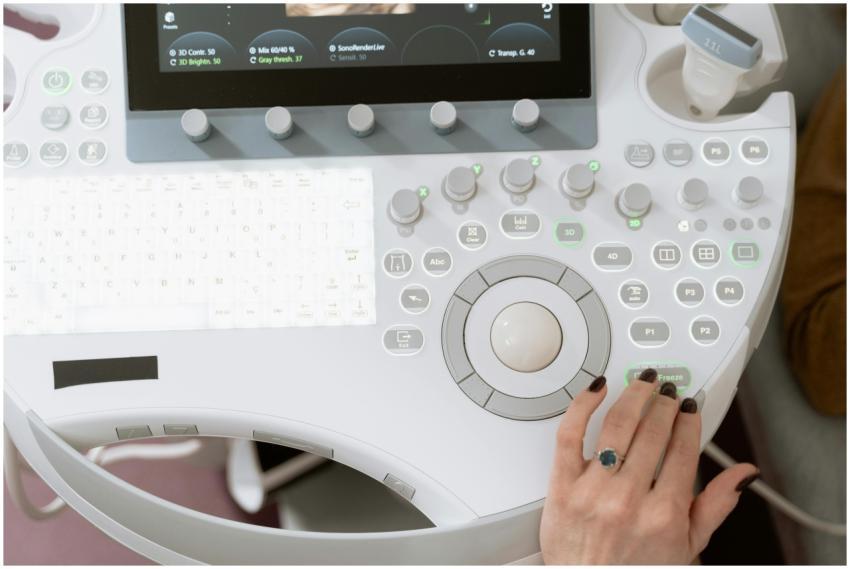 Close-up of a medical professional operating moder