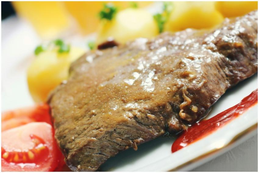 Mouth-watering steak served with potatoes and fres