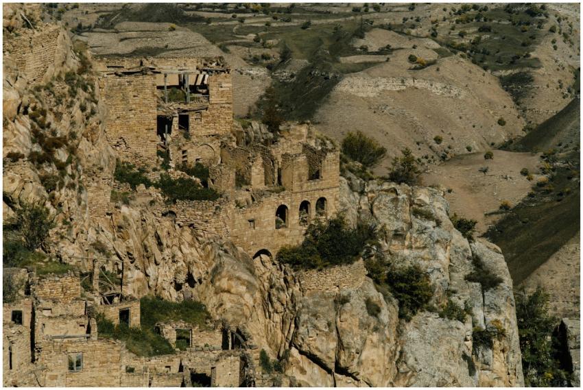 Explore these ancient ruins nestled in a rugged, e