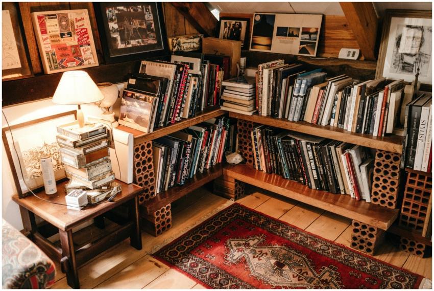 Warm and inviting home library with wooden shelves