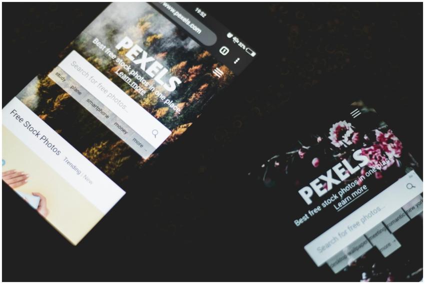 Close-up of smartphones displaying Pexels stock ph