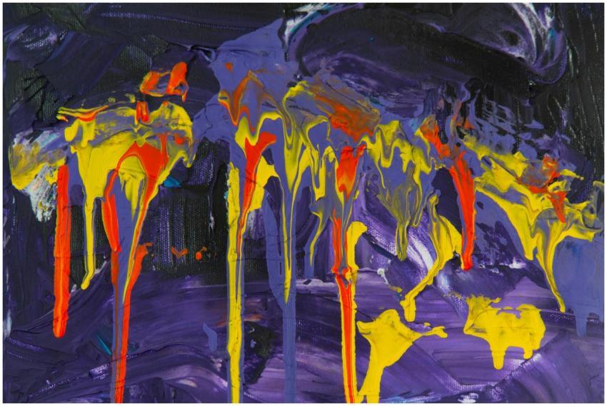 Dynamic splashes of yellow and purple acrylic pain