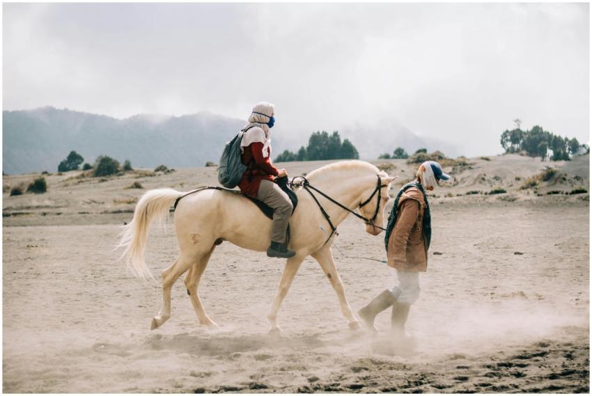 Horseback riding in the sandy terrain of East Java