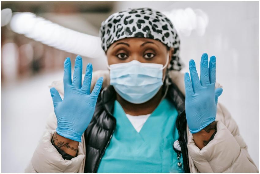 Pensive adult African American nurse wearing unifo