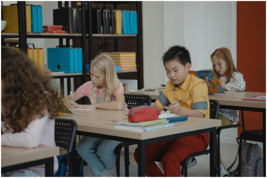 Children in a classroom setting, focusing on readi