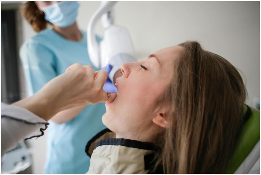 A close-up view of a dental examination with a pat