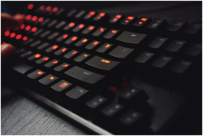Detailed view of a gaming keyboard with backlit ke