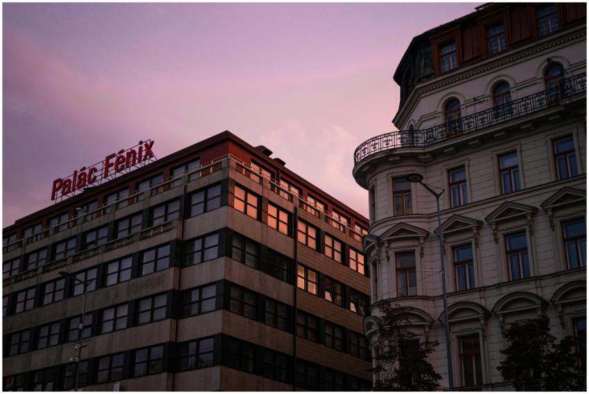 Twilight cityscape showing Palac Fenix buildings w