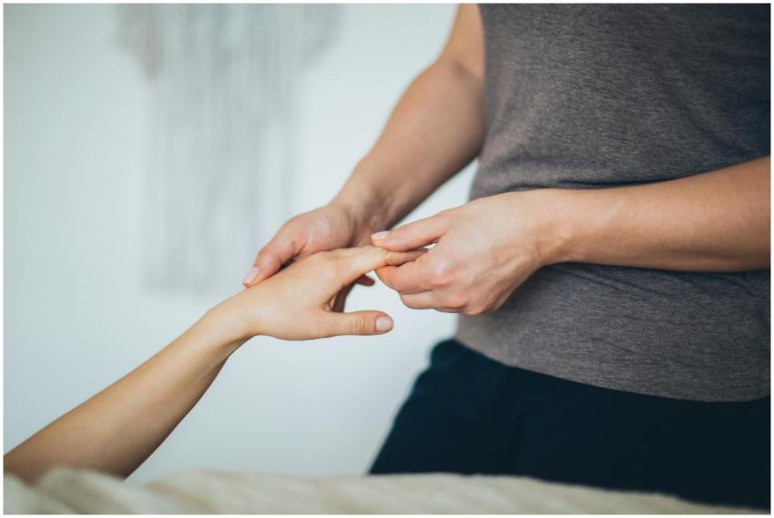 Close-up of a hand massage in a calming spa enviro