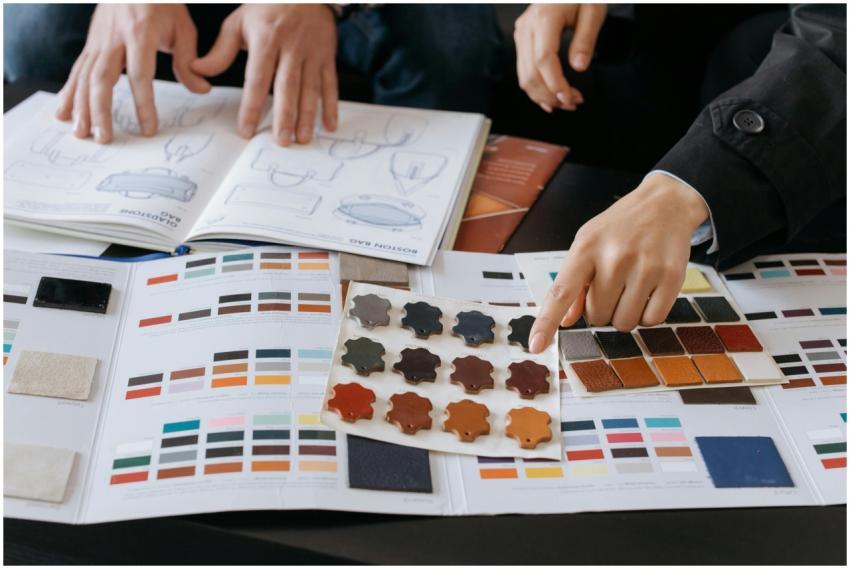 Designers reviewing color swatches and sketches fo