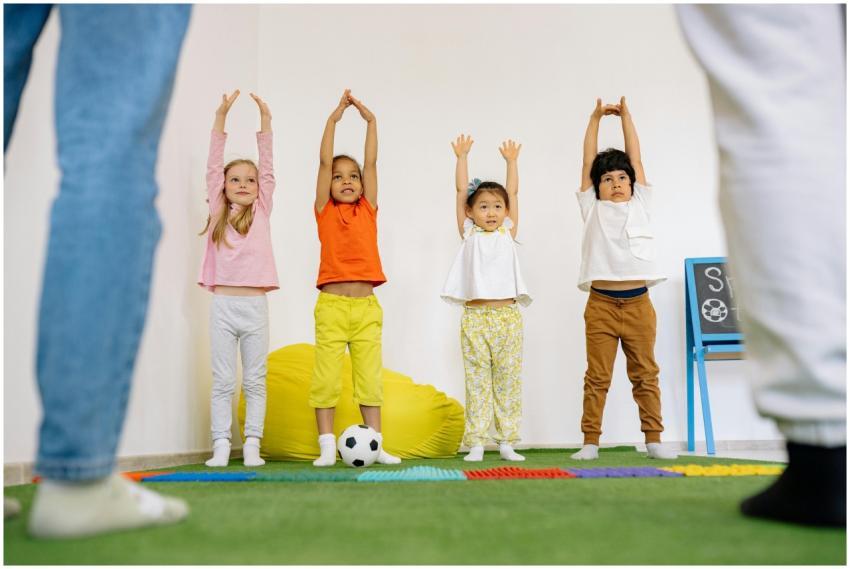 A diverse group of children enjoying indoor exerci