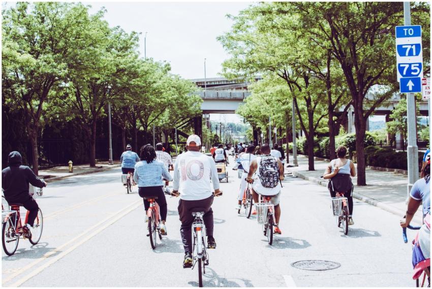 Cyclists enjoying a group ride on a sunny day in d