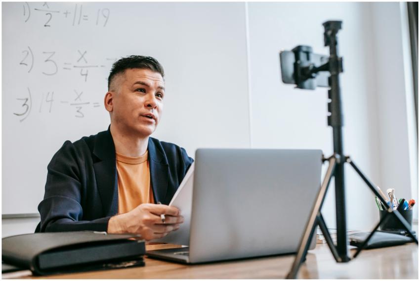 Male instructor conducting an online education ses