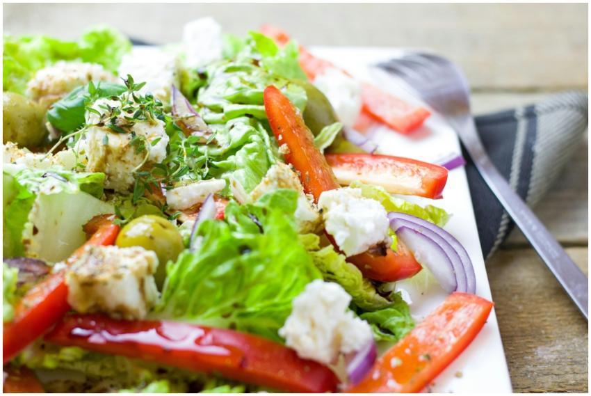 Colorful Greek salad with fresh vegetables and fet