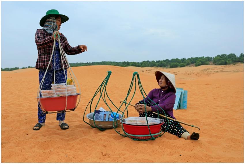 Two Women Selling Food