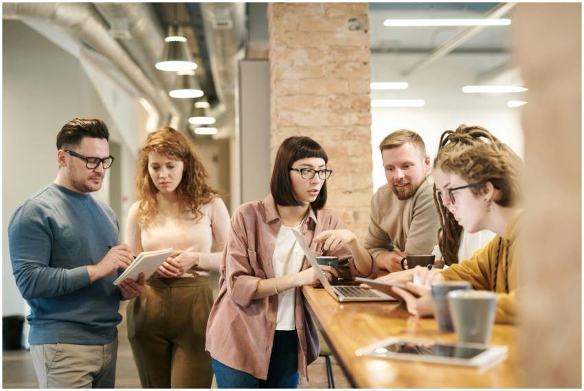 A diverse group of coworkers in a modern office en