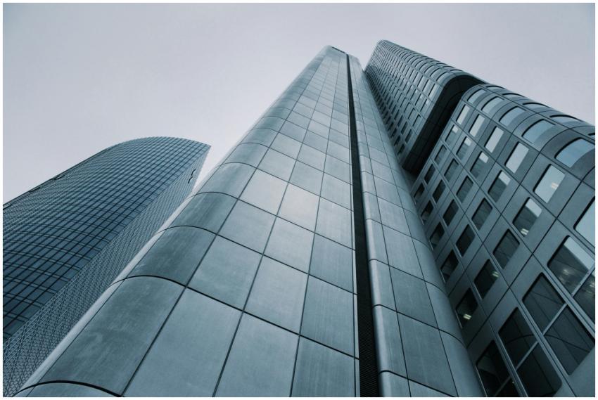 Low angle view of modern skyscrapers with glass an