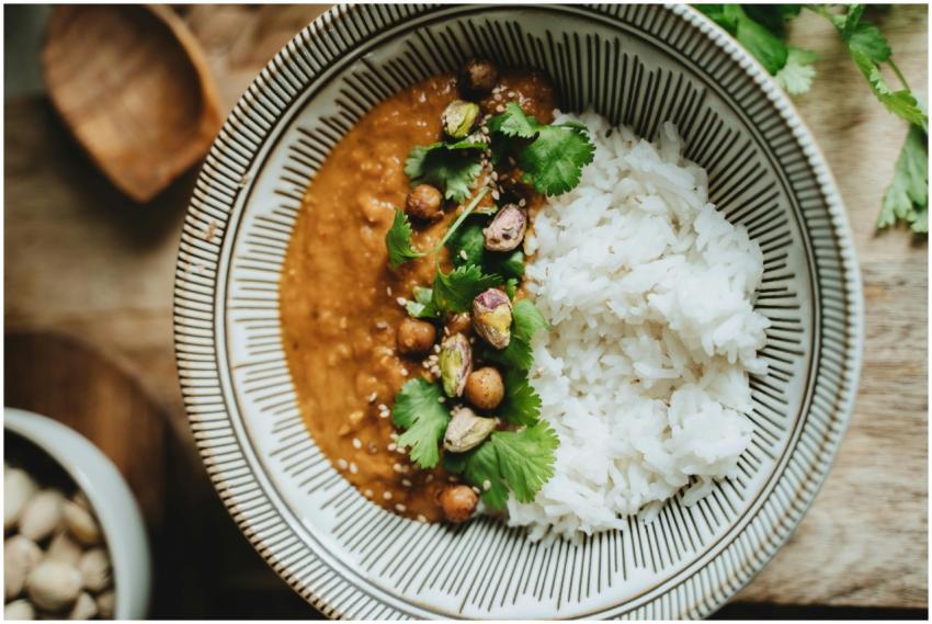 Delicious vegan rice bowl featuring lentil curry,