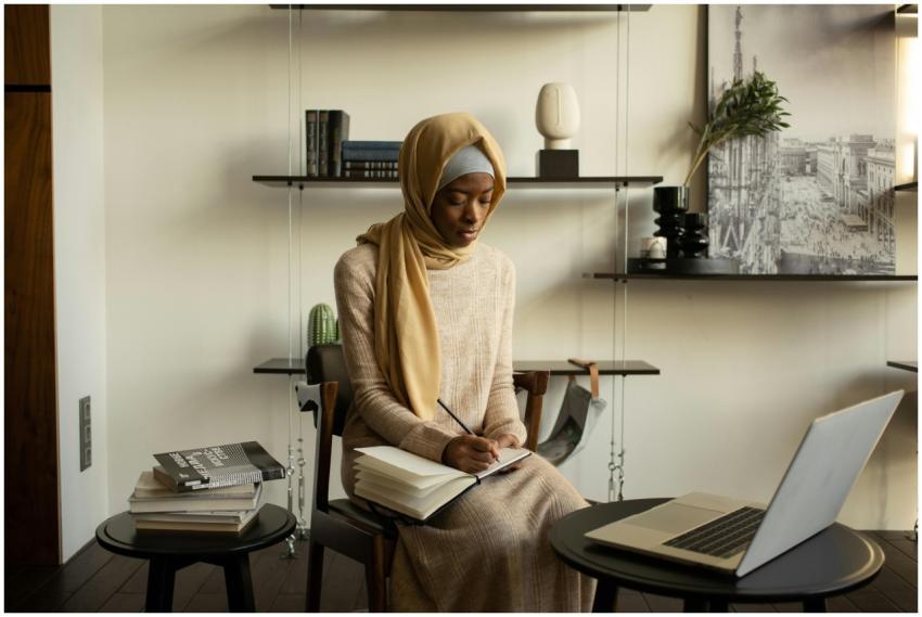 Concentrated young African American Muslim female