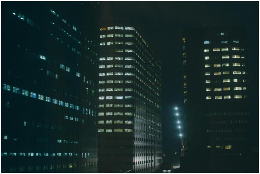 Night view of illuminated office buildings in a ci