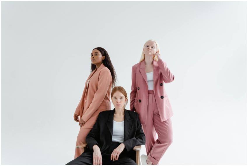 Three diverse businesswomen in stylish suits on a