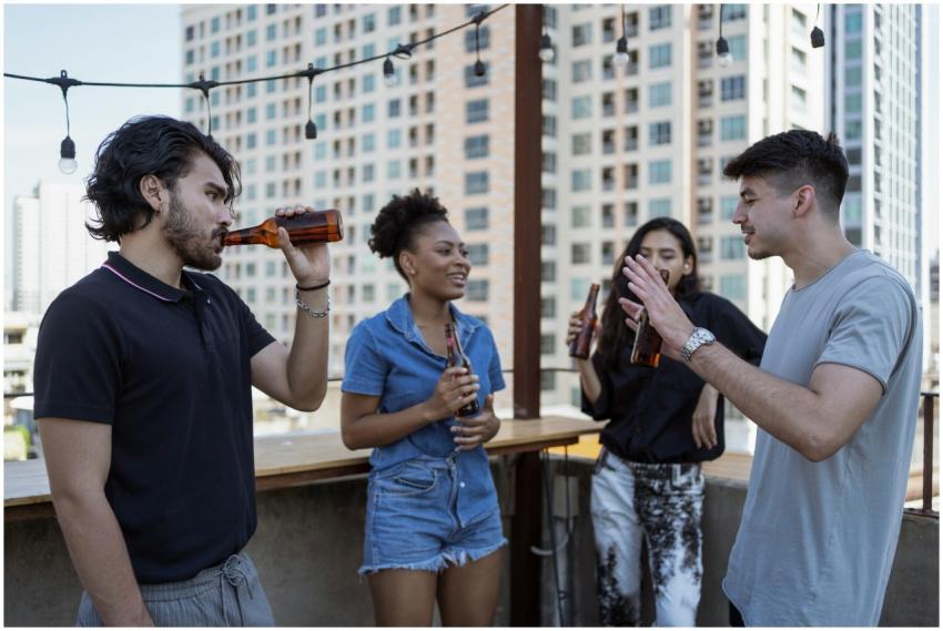 Group of friends enjoying drinks and conversation